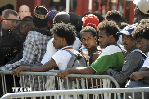 Người di cư và tị nạn tại Nantes, Pháp ngày 23/7. (Nguồn: AFP/TTXVN)