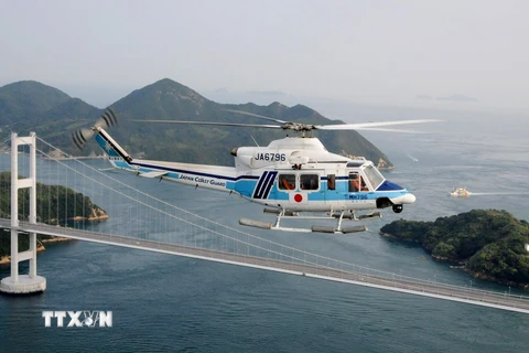 Ảnh tư liệu: Máy bay trực thăng cứu hộ Bell 412EP của Nhật Bản. (Nguồn: AFP/TTXVN)