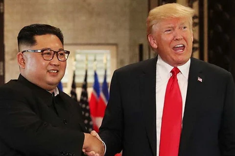 Tổng thống Mỹ Donald Trump và nhà lãnh đạo Triều Tiên Kim Jong-un tại cuộc gặp ở Singapore. (Nguồn: Getty)