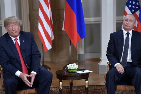 Tổng thống Nga Vladimir Putin (ảnh, phải) và người đồng cấp Mỹ Donald Trump (ảnh, trái). (Nguồn: Reuters)