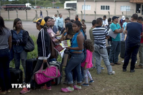 Ảnh tư liệu: Người di cư Venezuela tại thị trấn Pacaraima, bang Roraima, Brazil ngày 28/2. (Nguồn: AFP/TTXVN)