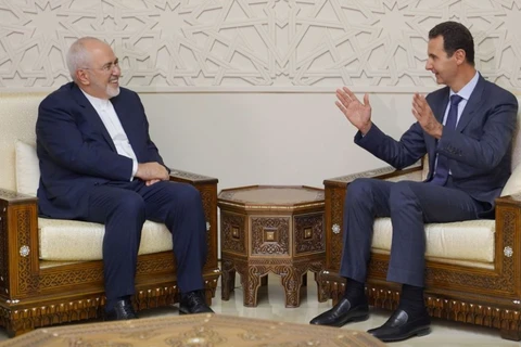 Ngoại trưởng Iran Mohammad Javad Zarif hội kiến với Tổng thống Syria Bashar al-Assad, ngày 3/9 ở Damascus. (Nguồn: Reuters)