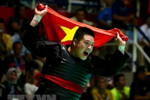 Võ sỹ Nguyễn Văn Trí giành huy chương vàng môn Pencak Silat tại ASIAD 2018. (Ảnh: Tuệ-Hưng/TTXVN)