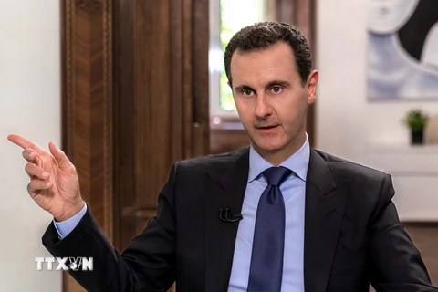 Ảnh tư liệu: Tổng thống Syria Bashar al-Assad trả lời phỏng vấn truyền thông Nga tại Damascus ngày 24/6. (Nguồn: AFP/TTXVN)