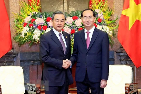 Chủ tịch nước Trần Đại Quang tiếp Ủy viên Quốc vụ, Bộ trưởng Bộ Ngoại giao Trung Quốc Vương Nghị, tháng 4/2018. (Ảnh: Nhan Sáng/TTXVN)