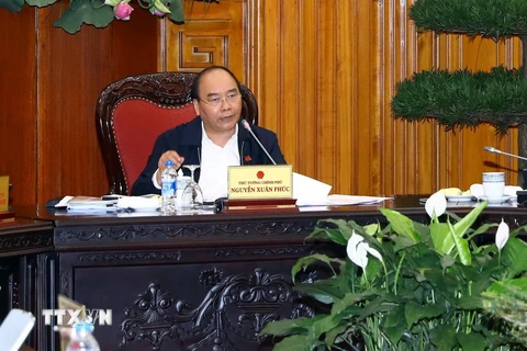 Thủ tướng Nguyễn Xuân Phúc chủ trì phiên họp thường trực Chính phủ. (Ảnh: Thống Nhất/TTXVN)