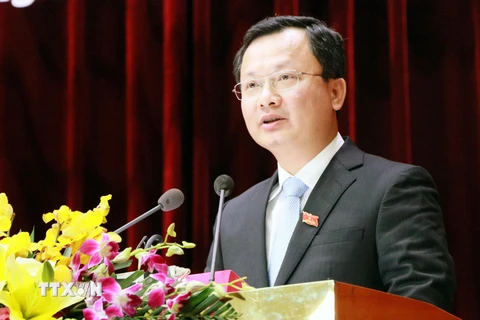 Ông Cao Tường Huy phát biểu tại kỳ họp Hội đồng Nhân dân tỉnh Quảng Ninh. (Ảnh: Văn Đức/TTXVN)