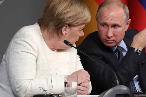 Tổng thống Nga Vladimir Putin và Thủ tướng Đức Angela Merkel. (Nguồn: Sputnik)