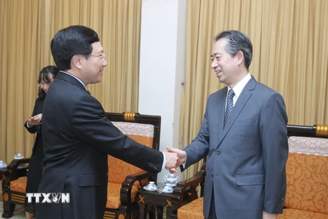 Phó Thủ tướng, Bộ trưởng Ngoại giao Phạm Bình Minh tiếp Đại sứ Trung Quốc tại Việt Nam Hùng Ba. (Ảnh: Lâm Khánh/TTXVN)