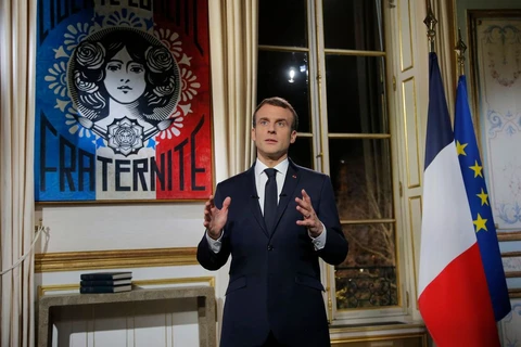 Tổng thống Pháp Emmanuel Macron phát biểu thông điệp Năm mới. (Nguồn: AFP)