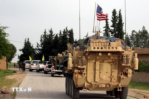 Ảnh tư liệu: Đoàn xe của các lực lượng Mỹ được triển khai tại Darbasiyah, Syria, ngày 28/4/2017. (Nguồn: AFP/TTXVN)