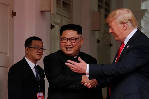 Tổng thống Mỹ Donald Trump và Nhà lãnh đạo Triều Tiên Kim Jong-un ở Singapore. (Nguồn: Reuters)