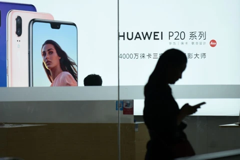 Một poster quảng cáo Huawei ở Bắc Kinh. (Nguồn: AFP)