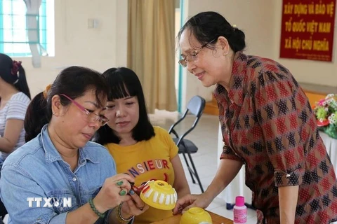 Hội Liên hiệp Phụ nữ Việt Nam chọn năm 2019 là Năm an toàn cho phụ nữ và trẻ em. Ảnh minh họa. (Nguồn: TTXVN)