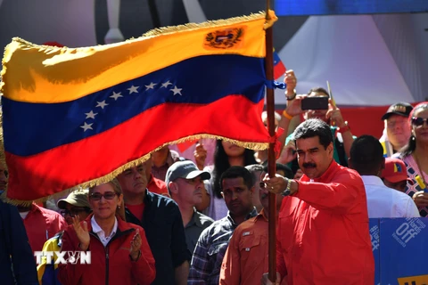 Tổng thống Venezuela Nicolas Maduro tham gia cuộc tuần hành ủng hộ Chính phủ ở Caracas ngày 23/2/2019. (Nguồn: THX/ TTXVN)
