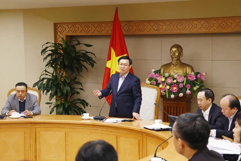 Phó Thủ tướng Vương Đình Huệ đề nghị các đại biểu tập trung đánh giá những khó khăn, vướng mắc trong quá trình tái cơ cấu các doanh nghiệp. (Ảnh: Lâm Khánh/TTXVN)