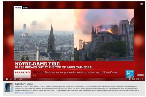 Ảnh chụp màn hình YouTube gán nhầm thông tin vụ khủng bố 11/9 vào video trực tiếp vụ cháy Nhà thờ Đức Bà Paris. (Nguồn: CNBC)