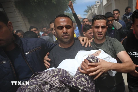 Hình ảnh Gaza tang thương, đổ nát trong mưa bom, rocket 