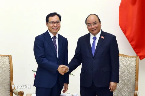 Thủ tướng Nguyễn Xuân Phúc tiếp ông Choi Joo-ho, Tổng giám đốc Tổ hợp Samsung Việt Nam. (Ảnh: Thống Nhất/TTXVN)