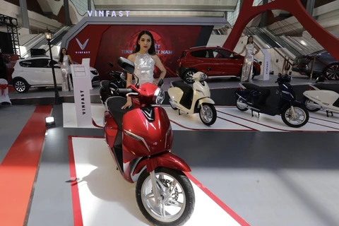 Gian triển lãm xe máy điện Vinfast của Việt Nam tại Triển lãm phương tiện giao thông, vận tải và công nghiệp phụ trợ 2019. (Ảnh: Trần Việt/TTXVN)
