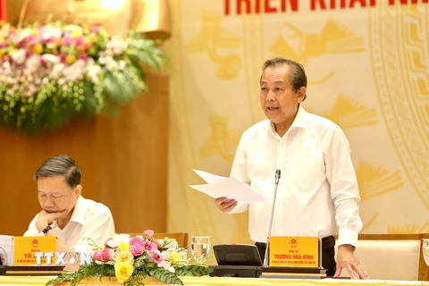 Phó Thủ tướng Thường trực Trương Hòa Bình, Trưởng Ban Chỉ đạo 138/CP và Ban Chỉ đạo 389 chủ trì hội nghị. (Ảnh: Dương Giang/TTXVN)