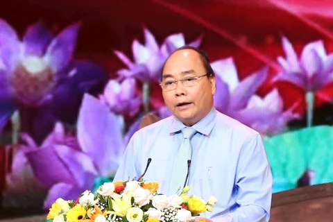 Thủ tướng Nguyễn Xuân Phúc phát biểu tại chương trình. (Ảnh: Phương Hoa/TTXVN)