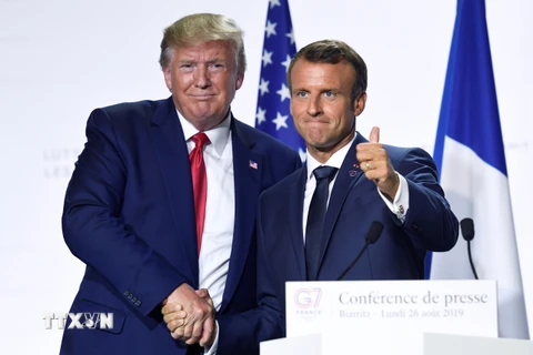 Tổng thống Pháp Emmanuel Macron (phải) tại cuộc họp báo chung với Tổng thống Mỹ Donald Trump khi kết thúc Hội nghị thượng đỉnh G7 ở Biarritz, Pháp ngày 26/8/2019. (Nguồn: AFP/TTXVN)