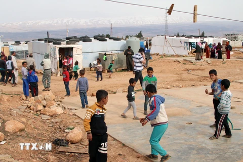 Người di cư Syria tại một trại tị nạn ở thung lũng Bekaa, Liban. (Nguồn: AFP/TTXVN)
