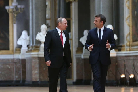 Tổng thống Nga Vladimir Putin và người đồng cấp Pháp Emmanuel Macron. (Nguồn: Getty Images)