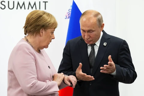 Tổng thống Nga Vladimir Putin và Thủ tướng Đức Angela Merkel. (Nguồn: Reuters)