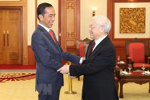 Tổng Bí thư Nguyễn Phú Trọng đón tiếp Tổng thống Indonesia Joko Widodo trong chuyến thăm Việt Nam, thàng 9/2018. (Nguồn: TTXVN)