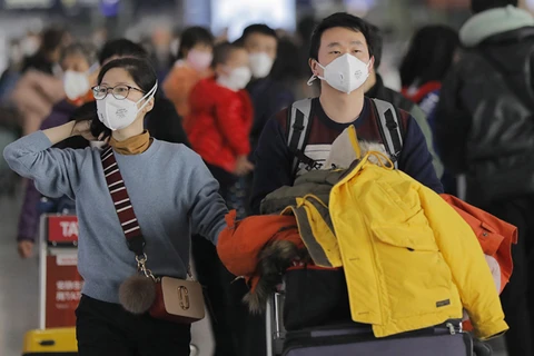 Trung Quốc đa yêu cầu người dân không di du lịch nước ngoài trong thời điểm bùng phát dịch viêm phổi do virus corona. (Nguồn: TASS)
