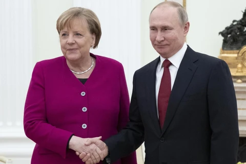 Thủ tướng Đức Angela Merkel và Tổng thống Nga Vladimir Putin. (Nguồn: AP)