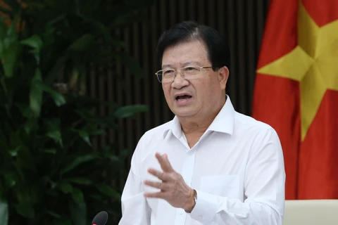 Phó Thủ tướng Trịnh Đình Dũng chủ trì cuộc họp phân vùng quy hoạch. (Ảnh: Dương Giang/TTXVN)