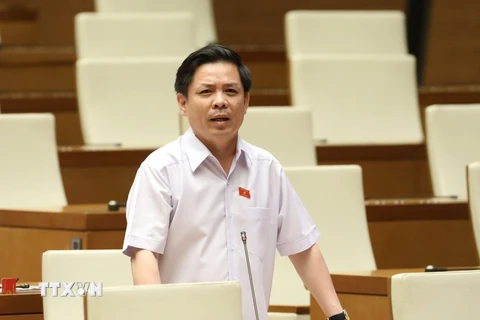 Bộ trưởng Bộ Giao thông Vận tải Nguyễn Văn Thể phát biểu giải trình, làm rõ vấn đề đại biểu Quốc hội nêu. (Ảnh: Văn Điệp/TTXVN)