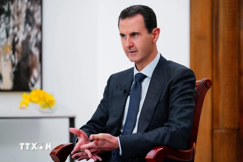 Tổng thống Syria Bashar al- Assad trả lời phỏng vấn báo chí ở Damascus. (Nguồn: AFP/TTXVN)