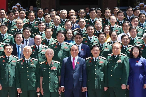 Thủ tướng Nguyễn Xuân Phúc, Phó Chủ tịch Đặng Thị Ngọc Thịnh với các đại biểu. (Ảnh: Thống Nhất/TTXVN)