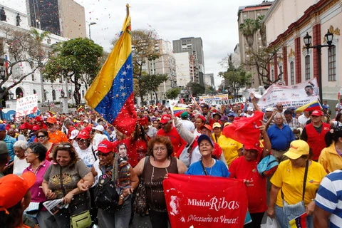 Người dân Venezuela đã tham gia cuộc tuần hành vì hòa bình tại thủ đô Caracas nhằm bày tỏ sự ủng hộ đối với Tổng thống Nicolas Maduro và chính phủ của ông. (Nguồn: THX/TTXVN)