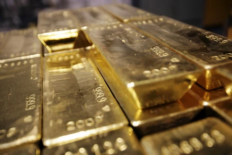 Giá vàng châu Á lập mức thấp kỷ lục mới trong bốn năm rưỡi