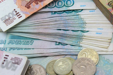 Thị trường Nga bất ổn do tỷ giá hối đoái giữa Ruble và USD tăng
