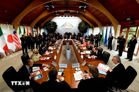 Các đại diện cấp cao tại Hội nghị G7 mở rộng. (Nguồn: AFP/TTXVN)