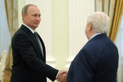 Tổng thống Nga Putin và ngoại trưởng Syria Walid al-Mualem trong cuộc hội đàm. (Nguồn: RIA Novosti)