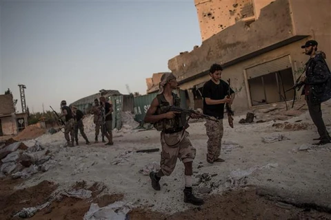 Binh sỹ Chính phủ đoàn kết dân tộc (GNA) trong cuộc giao tranh với phiến quân tại Salah al-Din ở Tripoli, Libya, ngày 29/7/2019. (Nguồn: THX/ TTXVN)