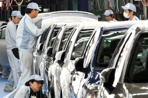 Nhật Bản hạ dự báo về tăng trưởng kinh tế tài khóa 2014