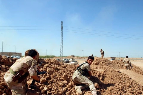 Anh cấp tốc huấn luyện lực lượng người Kurd dùng súng máy hạng nặng