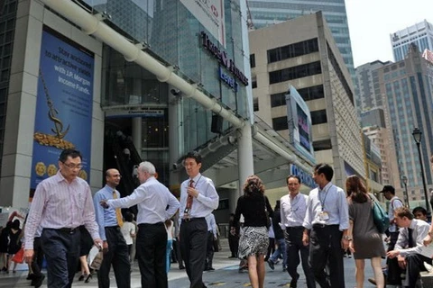 Singapore sẽ thắt chặt thị trường lao động trong năm 2015