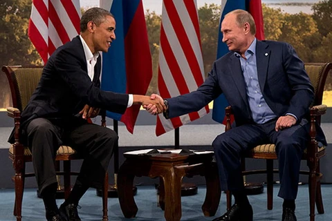 Tổng thống Nga Vladimir Putin và người đồng cấp Mỹ Barack Obama. (Nguồn: AP)