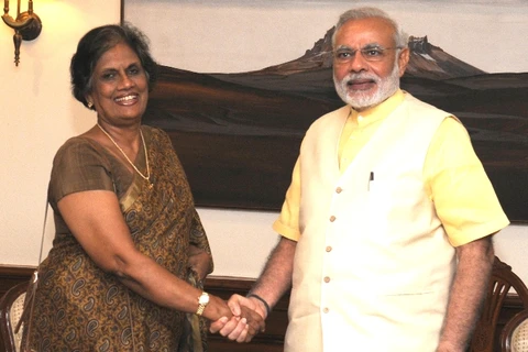 Thủ tướng Ấn Độ Narendra Moditại cuộc gặp với cựu Tổng thống Sri Lanka Chandrika Kumaratung. (Nguồn:narendramodi.in)