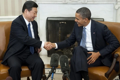Chủ tịch Trung Quốc Tập Cận Bình (trái) và Tổng thống Mỹ Barack Obama. (Nguồn: huffingtonpost.com)