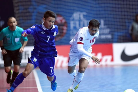 Futsal Việt Nam (áo trắng) sẵn sàng cho mục tiêu giành một suất dự World Cup. (Ảnh: VFF)